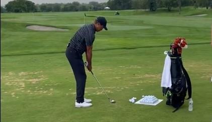 Tiger Woods hits balls in front of fans at 2022 Nexus Cup