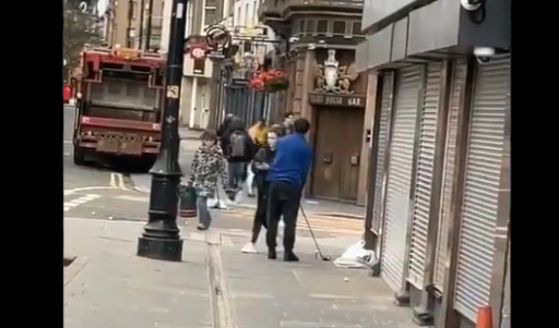 OUTRAGE: Man SMASHES golf ball down busy Dundee high street!