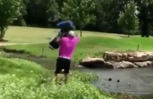 Golfer throws all of his golf clubs in the lake following nightmare round