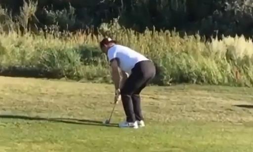 Golfer chips in using HALF a club after snapping it into two pieces