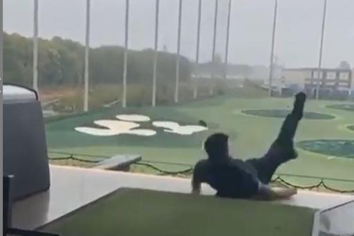 Golfer has absolute NIGHTMARE after topping ball on driving range and slipping!