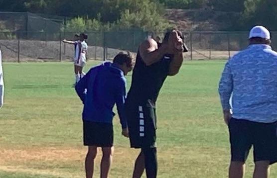 Tiger Woods spotted practice-swinging at soccer match