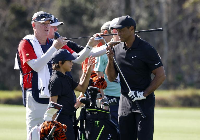 Watch: Tiger Woods DISTRACTING Charlie on the putting green, just like his dad