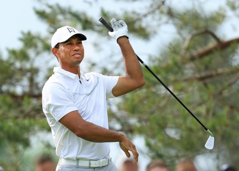 Tiger says his back is tight - but 'it's no biggy'