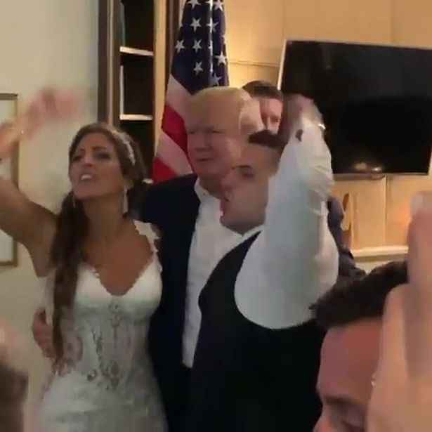 Donald Trump crashes wedding and kisses bride