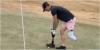 Frustrated golfer FED UP of three-putting drains putt using prosthesis! 