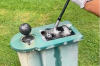 Golf fans react as group of golfers clubs in a BALL CLEANER