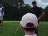 phil mickelson receives golf shot advice from little boy in crowd
