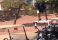 Guy jumps off a golf cart onto another in epic golf fail...