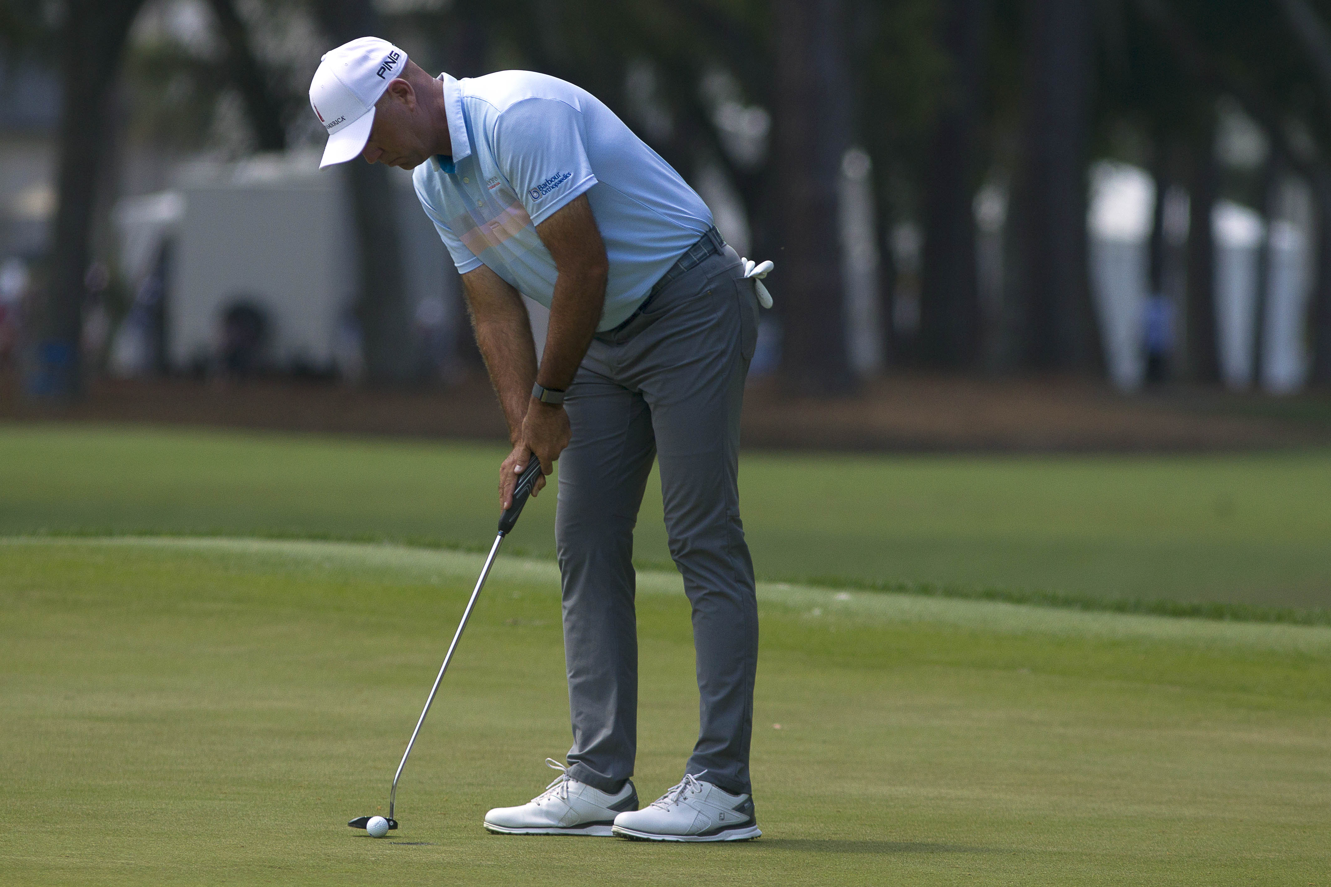 Golf fans react as Ian Poulter watches F1 DURING last round at the RBC Heritage