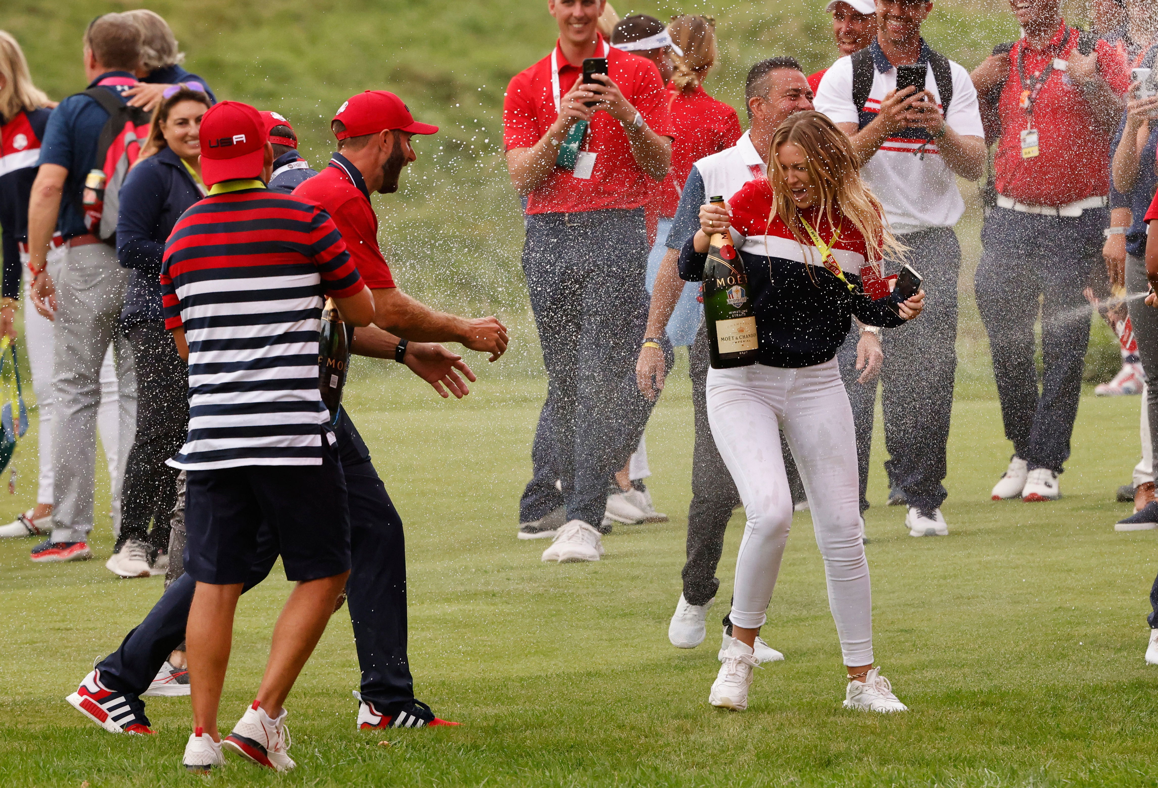 Paulina Gretzky celebrates as Dustin Johnson makes RYDER CUP HISTORY!