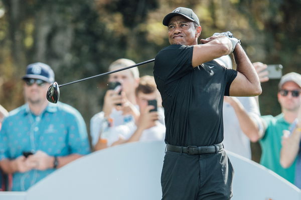 EXHAUSTED Tiger Woods watches son Charlie on driving range after Pro-Am round