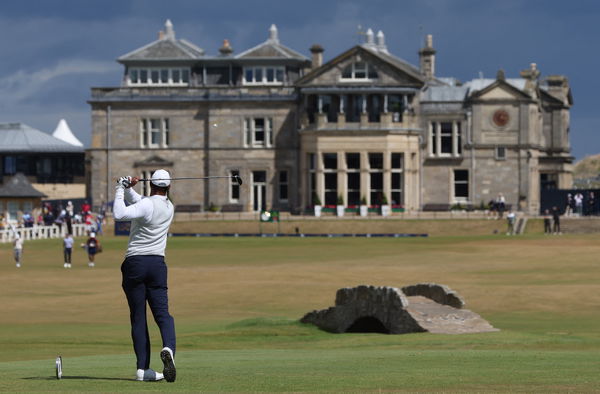 Charlie Woods looks unrecognisable as Tiger Woods returns to caddying duties