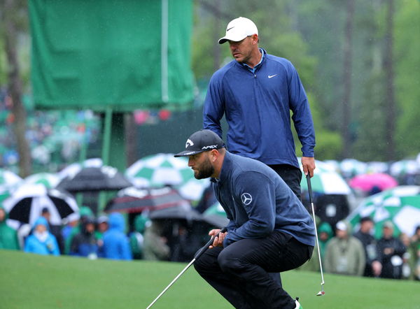 Brooks Koepka extends Masters lead as third round is suspended by weather