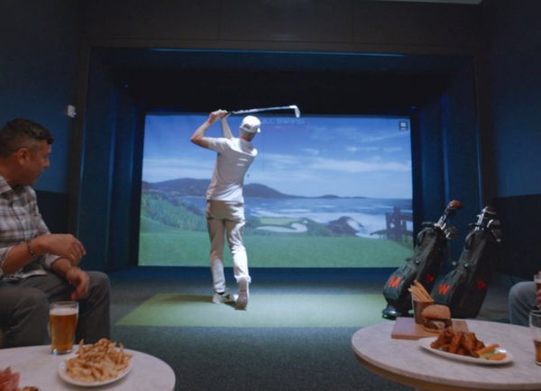 Tiger Woods and Justin Timberlake unveil sports bar and indoor golf experience