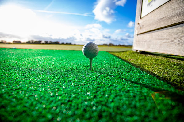 Golf fans react as Justine Ezarik hits golf ball with LIGHTSABER at TOPGOLF