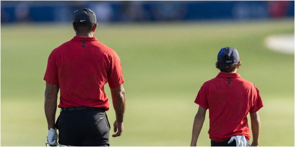 Watch: Tiger Woods DISTRACTING Charlie on the putting green, just like his dad