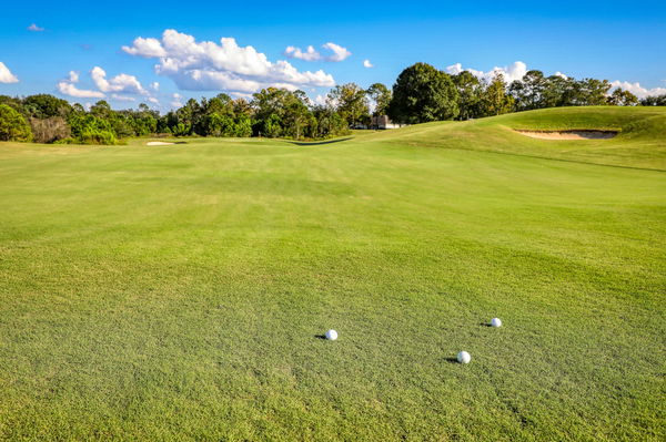 Do you have to place your marker behind the golf ball on the green?